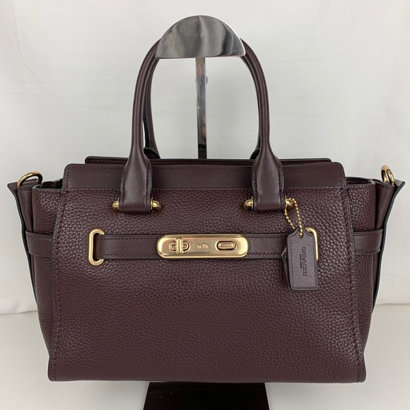 Coach Handbags - Coach Swagger 27 in Oxblood Pebbled Leather